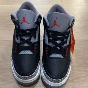 Jordan Kids Black and Gray Sneakers with Red Accents